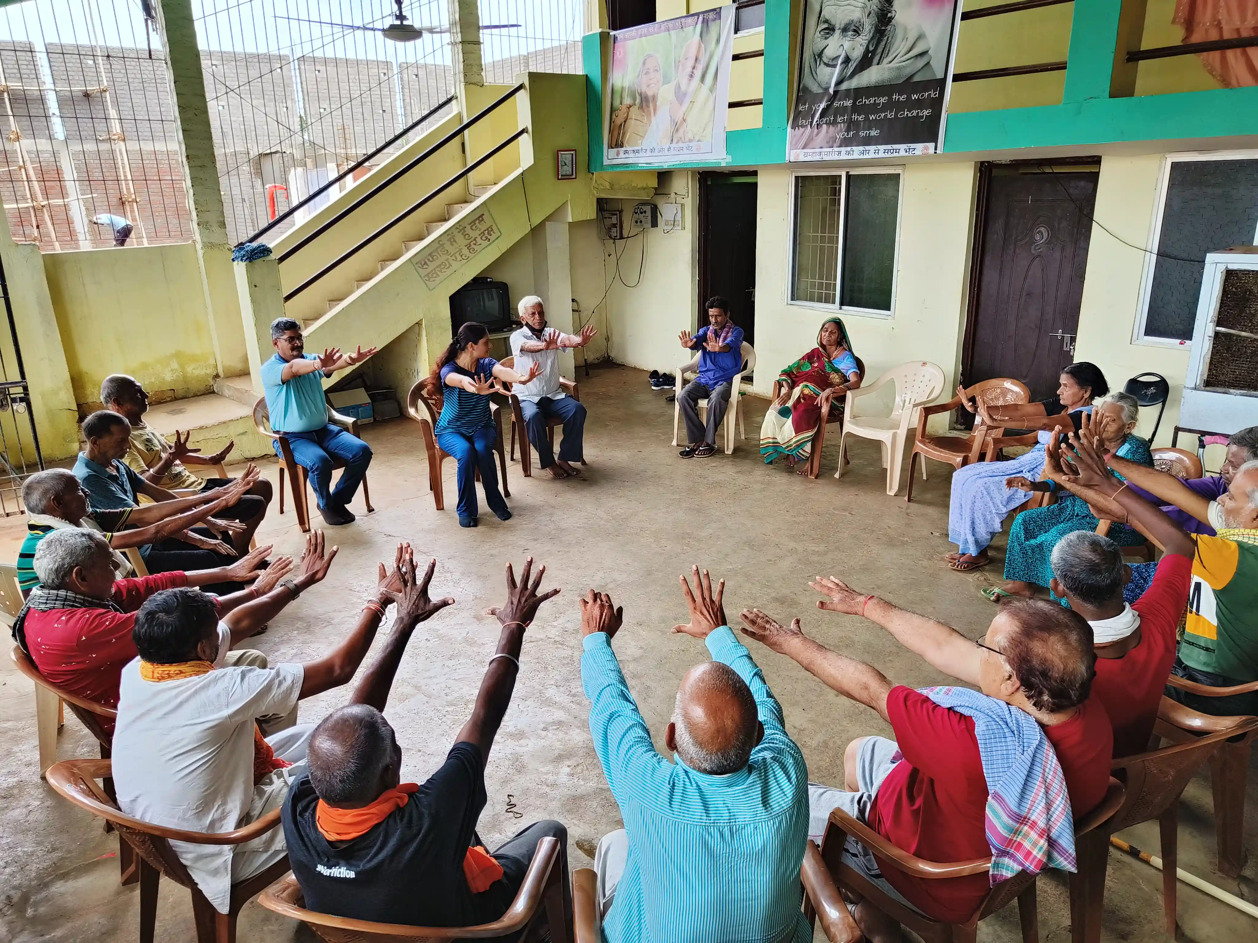 Community health camp and doctor interacting with patients